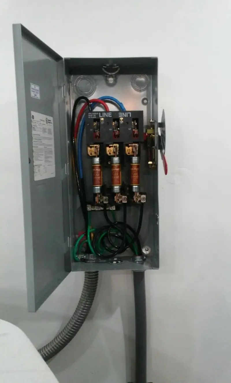 Three-phase disconnect switch installed for Smoke Detector Installation in Rochester